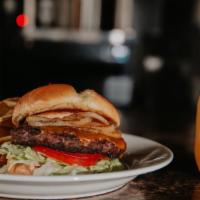 Jamie'S Classic Cheeseburger · 1/2 pound char-broiled juicy hamburger patty topped with shredded lettuce, sliced tomatoes, ...