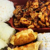 Box H: Spicy Chicken Box · Spicy teriyaki chicken, California roll (4 pcs), crunch roll (4 pcs), gyoza (2 pcs), rice.