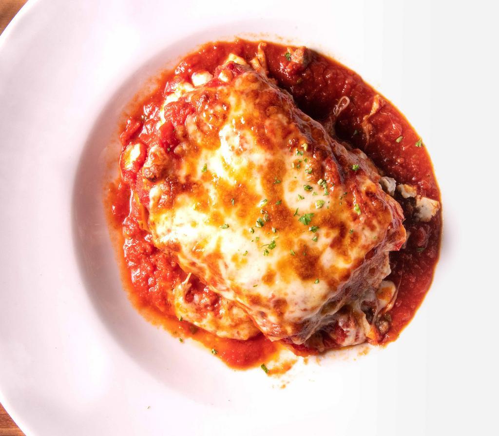 Lasagna · W/ beef, ricotta, marinara, Mozzarella.
