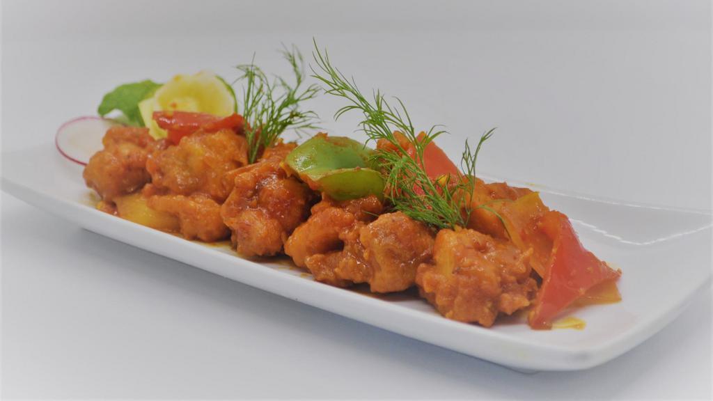 Chilli Chicken · Popular indo-chinese spicy appetizer marinated with spices, deep fried and cooked to perfection.