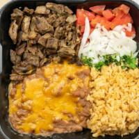 Asada Plate · Served with salad, beans, guacamole, salsa & choice of tortillas.
