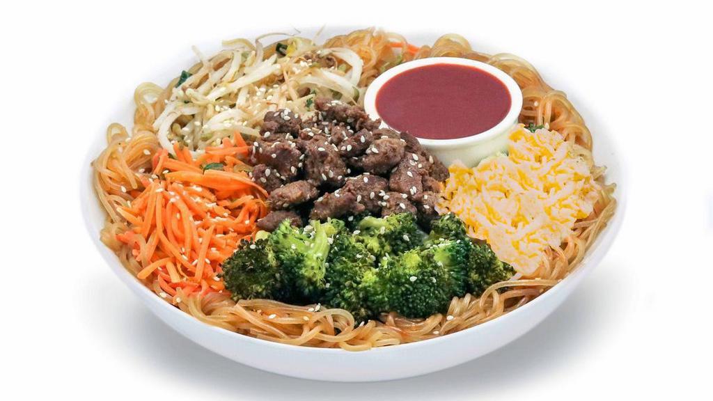 Heart & Seoul Noodle Bowl · Savory noodles and steak with sweet & crunchy vegetables, finished with traditional spicy Korean Gochujang.  Steak with sprouts, carrot, broccoli, egg and sesame seeds over sweet potato noodles, finished with gochujang sauce.