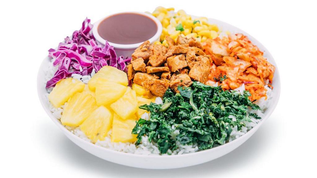 Sweet & Spicy Chicken Bowl · Sweet and spicy, this bowl adds a fiery kick to your day!  Spicy chicken with corn, kimchi, red cabbage, pineapple and kale over white rice, finished with gochujang sauce.