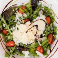 Midici House Salad · Mixed greens, parmigiano reggiano, grape tomatoes tossed in vinaigrette dressing.