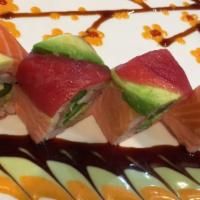 Fujiyama Roll · Shrimp, asparagus and avocado wrapped with soy beans nori topped with salmon, tuna, avocado ...