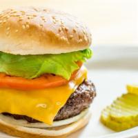 Cheeseburger · Served with grilled onions, lettuce, tomato, pickles, cheddar cheese & thousand island sauce.