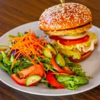 Garden Burger · Veggie burger patty, lettuce, tomato, pickles & spread of hummus on a whole wheat bun.