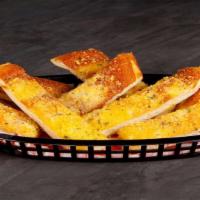 Garlic Bread (Half) · Our garlicky cheesy loaf rounds out any meal. Add it to pizza. Add it to chicken. Add it to ...