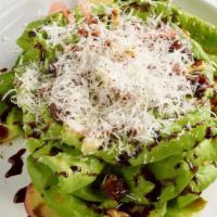Evita Salad · Butter lettuce, candied walnuts, pickled onions, apple, dates, manchego cheese, and balsamic...