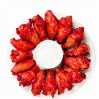 Bbq Wings · Fried and tossed in our homemade BBQ sauce. Comes with celery sticks and the dipping sauce o...