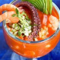 Coctel De Camaron · Mexican shrimp, cocktail sauce, onion, cilantro, tomato, avocado