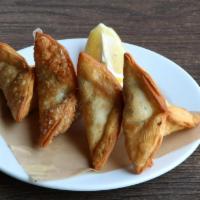 Spinach Boreg · Fried pastry pie filled with seasoned spinach & red onions.