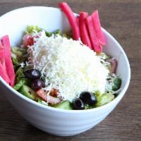 Greek Salad · Romaine lettuce, tomatoes, Persian cucumbers & red onions tossed to order in our blend of ol...