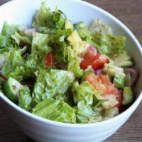 Garden Salad · Romaine lettuce, tomatoes, Persian cucumbers & red onions tossed to order in our blend of ol...