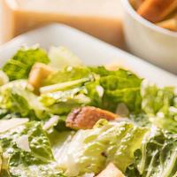 Caesar Salad · Hearts of romaine, croutons and shredded Parmesan cheese.