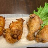 Chicken Wings 4Pcs · Deep fried chicken wings marinated our special house sauce, served with sweet and sour sauce.