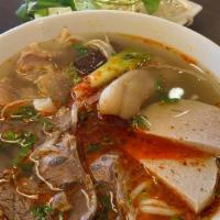 Special Spicy Beef Noodle Soup ( Bun Bo Hue Dac Biet) · The combination of Beef shank, pork roll, steam pork.