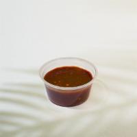 Jerk Sauce (2Oz.) · Our house-made Jerk Sauce, medium spice level.