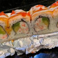 Lion King Roll · California roll topped with baked salmon, special sauce, masago.