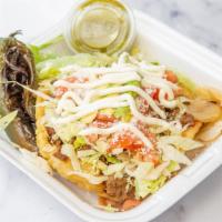 Sopes · Fried Hand made corn tortilla, Choice of meat, Lettuce, tomato, Pinto beans, cheese,sour cre...