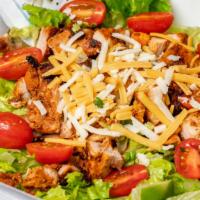 Chicken Salad · Chicken adobada, lettuce, Tomato, cheese, guacamole, and salad dressing.