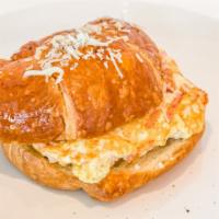 Breakfast Croissant · Two scrambled eggs, gruyère cheese and French ham in a freshly baked croissant.