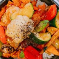 Clay Pot Rice · Rice cooked in clay pot sautéed with chicken, shrimps, onion, mushroom, carrot, baby corn, z...