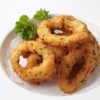 Calamari Rings · Crispy deep fried squid served with chili mayo dipping sauce.