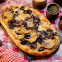 Truffled Pizza · organic creme seasoned with garlic + shallots, potato, truffle oil with mozzarella on our ar...