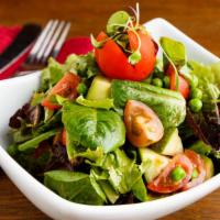 Saint Felix'S House Salad · Mixed field greens with diced cucumbers, jicama, cherry tomatoes, & peas tossed in a balsami...