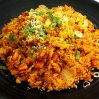 Kimchi Spam Fried Rice · Stir fried rice with house spicy sauce, kimchi, spam, onions, and green onions.