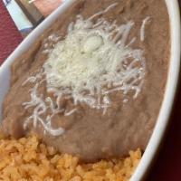 Frijoles Y Queso / Bean And Cheese · Frijoles refritos y queso. / Refried beans and cheese.