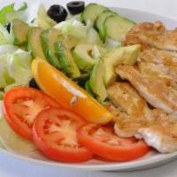 Chicken Breast Salad · Topped with grilled chicken breast or crispy chicken tender, avocado, tomato, olives on a be...