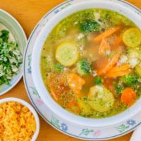 Caldo De Pollo & Tortillas · Chicken soup with veggies and rice.