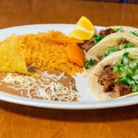 3 Pork Tacos W/Rice & Beans · Carnitas(pork) cilandro, onion & green sauce