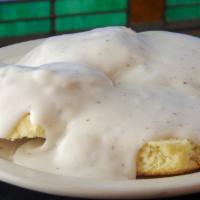 Biscuit And Gravy · Two large buttermilk pancakes smothered in country gravy.