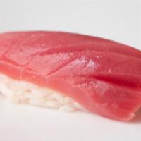 Tuna · Priced per piece.