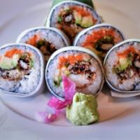 Softshell Crab Cut Roll · Fried soft shell crab with masago (fish roe), avocado, and negi (scallion) wrapped in shaved...