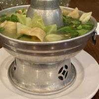 Wor Wonton Soup
 · Thin crepes filled with ground chicken, served in a chicken broth with shrimp, chicken and a...