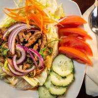 Beef Salad
 · Mild.Slices of charbroiled tender beef mixed with onions, chili peppers and fresh mint leave...
