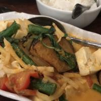 Red Curry
 · Mild.Eggplant, green bean, red bell pepper and sweet Thai basil with bamboo shoots simmered ...