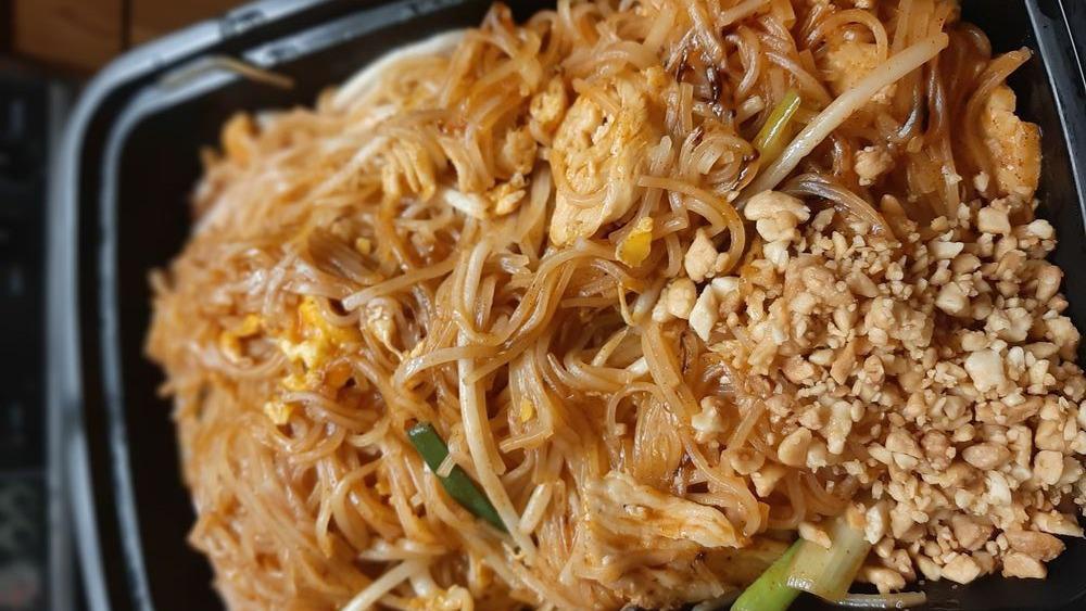 Pad Thai Noodles
 · One of Thailand's best-known noodle dishes. Pan-fried rice noodles with choice of meat, egg, ground peanuts, bean sprouts and green onions.
