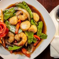 Scallop And Shrimp
 · With onions, red bell pepper and snow peas in a spicy oyster sauce.