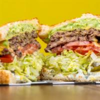 All Star · 2 burger patties, mayo, pickles, lettuce, tomato, cheese and avocado all on a grilled sourdo...
