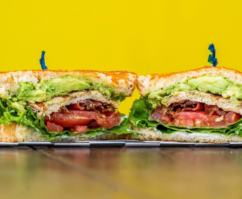 Club Sandwich · Mayo, lettuce, tomato, bacon, avocado and grilled chicken breast, all on a grilled sourdough.