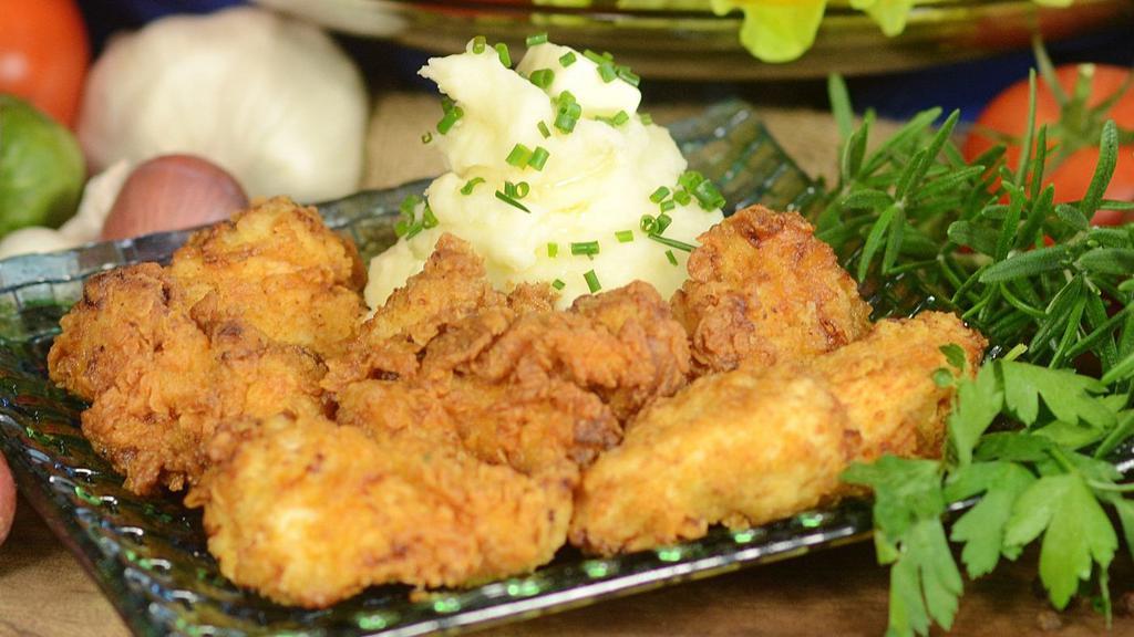 Fried Chicken Family Meal · 12 pieces of fried chicken breast,
1 pound mashed potatoes or fries (ketchup & ranch dressing), 
green salad