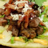 Steak & Bacon Tacos · housemade corn tortillas, chipotle aioli, grilled steak, bacon, onions, salsa, cilantro, let...