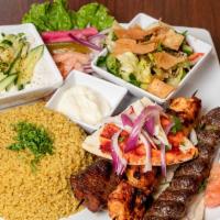 Mixed Grilled | 3 Skewers · Beef, chicken and kafta, seasoned to perfection. served with your choose of Rice, French Fri...