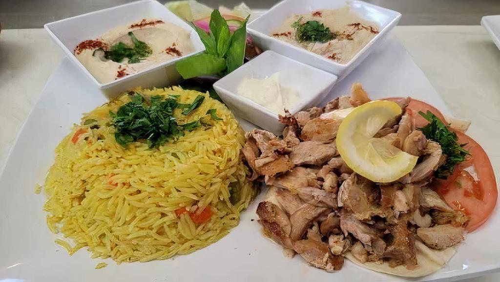 Chicken Shawarma Plate · Marinated and flame-broiled chicken, thin cut. served with your choose of Rice, French Fries  or bulgur with 2 cold appetizers of your choice