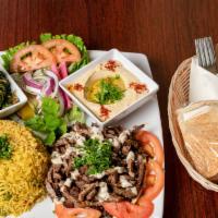 Beef Shawarma Plate · Marinated tri-tip, thinly sliced and flame-broiled, always fresh, hand cut served with your ...
